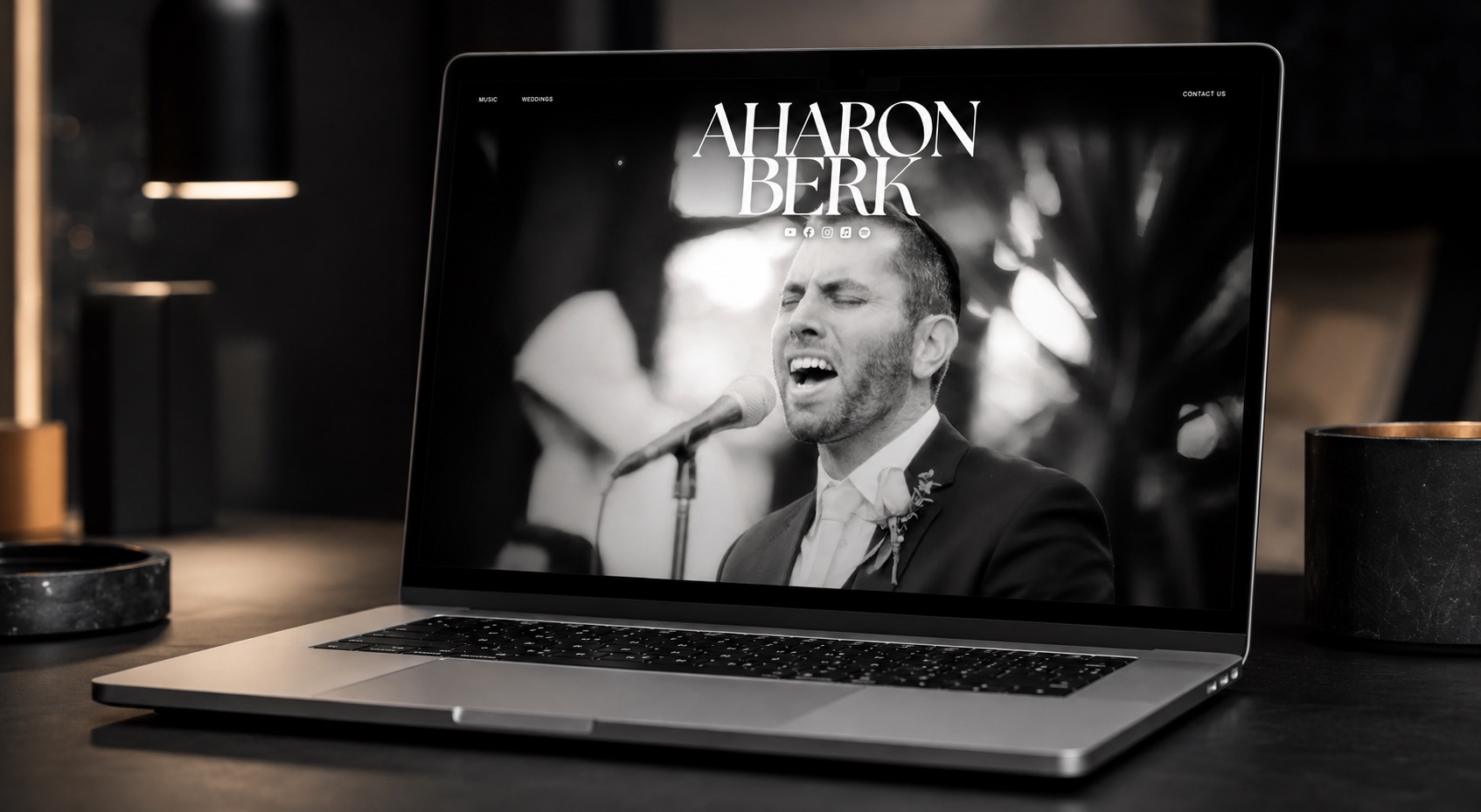 Aharon Berk site on a laptop